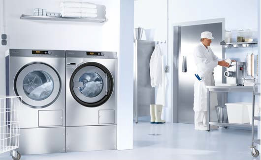 Miele Professional Waschmaschine Frontlader groß in Waschküche